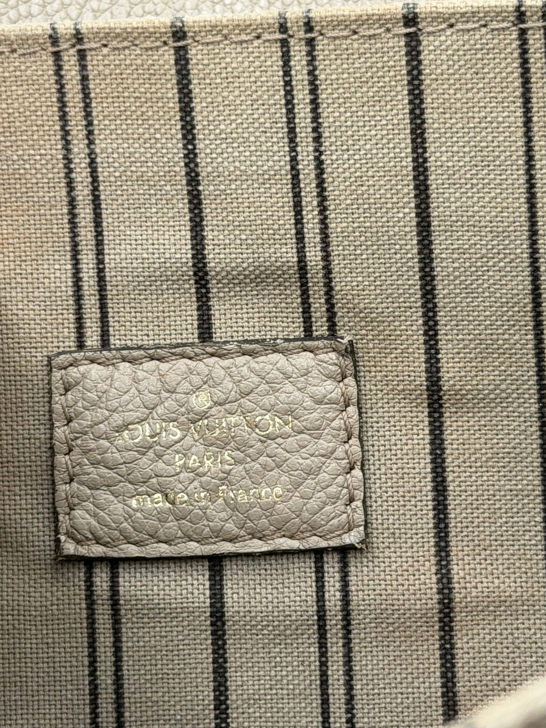 Louis Vuitton Métis pelle empriente