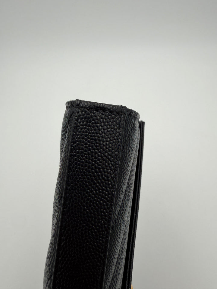 Pochette con catena Cassandre