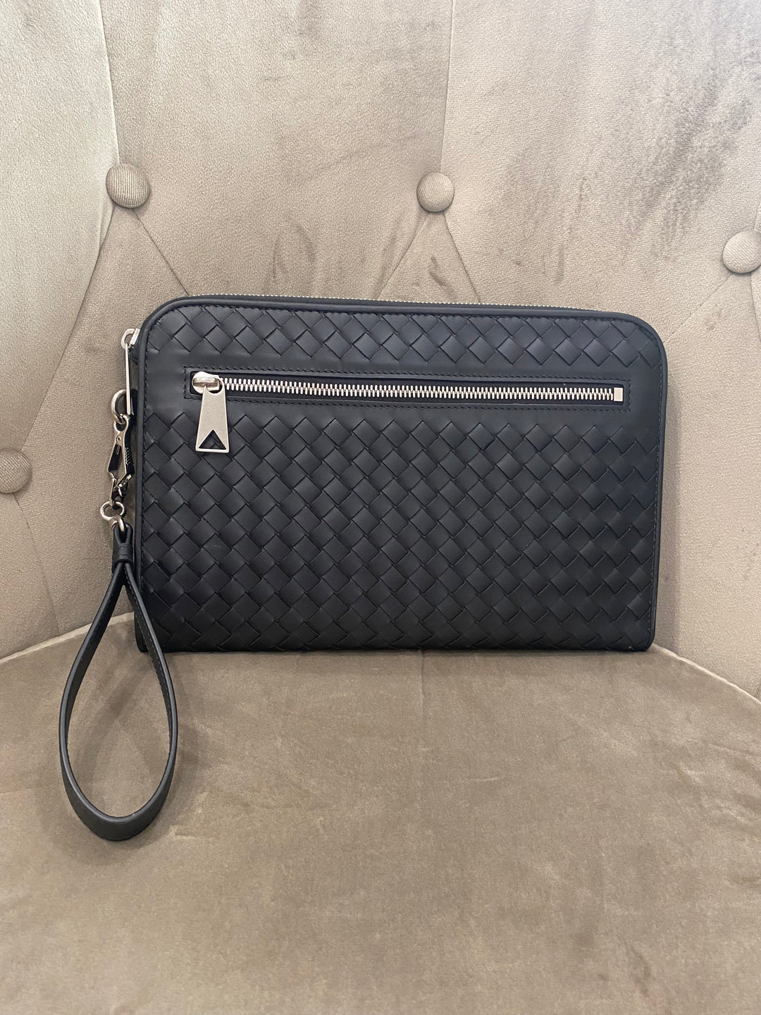 Pochette Bottega Veneta in pelle intrecciata nera