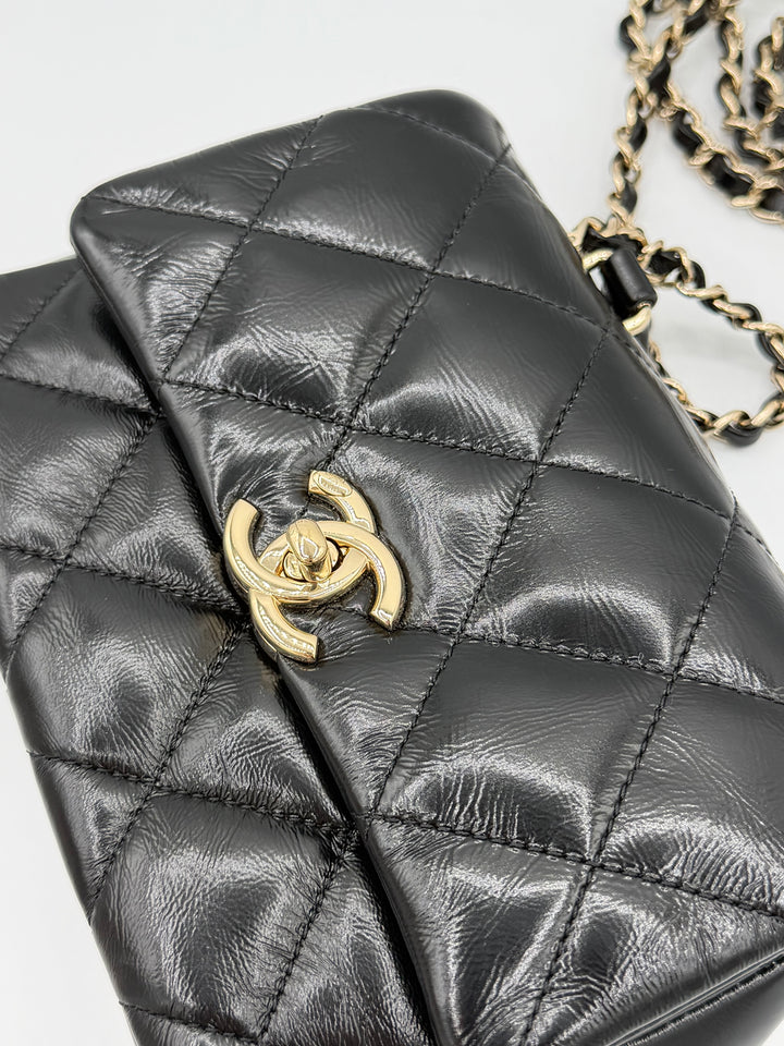 Chanel Mini Flap con manico