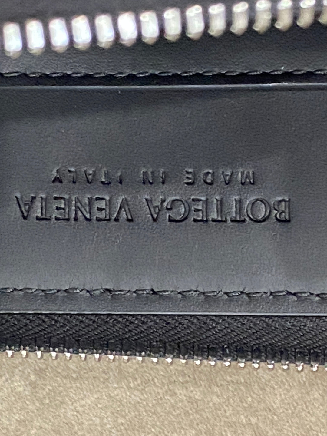 Pochette Bottega Veneta in pelle intrecciata nera