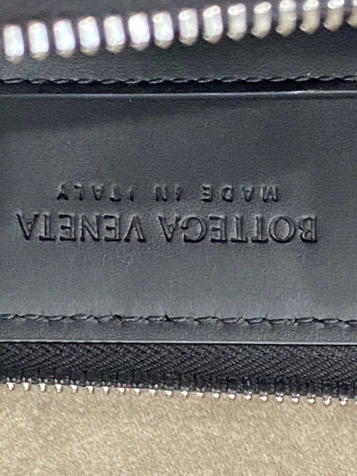 Pochette Bottega Veneta in pelle intrecciata nera
