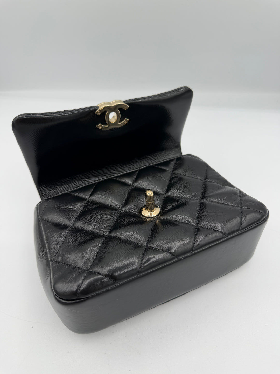 Chanel Mini Flap con manico