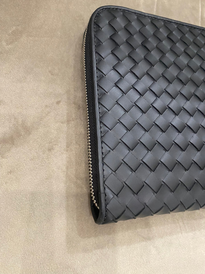 Pochette Bottega Veneta in pelle intrecciata nera