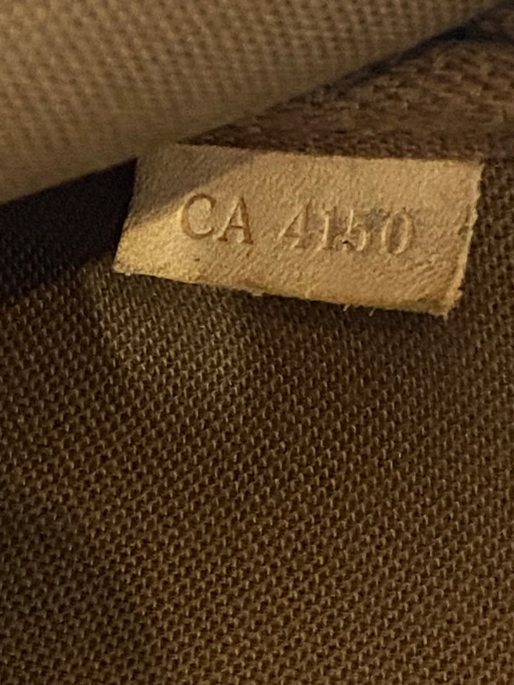 Pochette Accessorio Monogramma Louis Vuitton