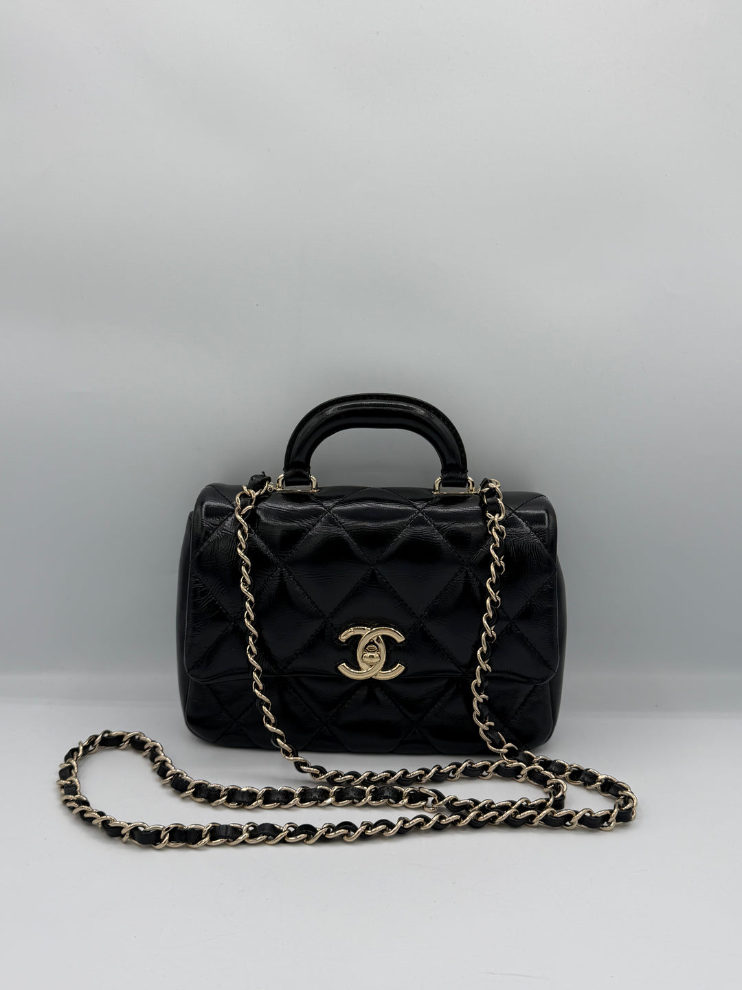 Chanel Mini Flap con manico
